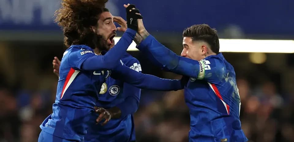 Chelsea players celebrating a goal during a match