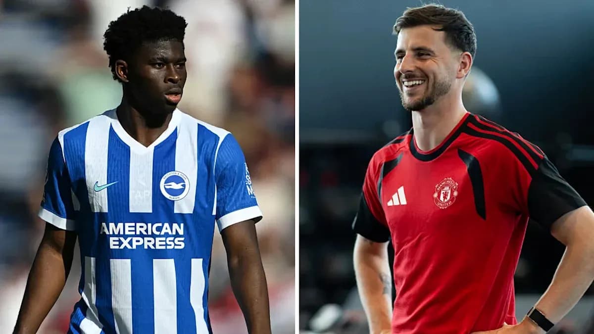 Two football players in club jerseys posing