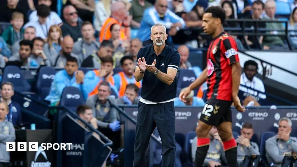 Bournemouth coach instructing player during match