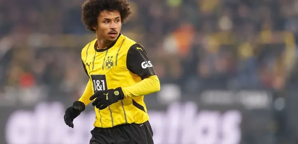 Borussia Dortmund player running on the field