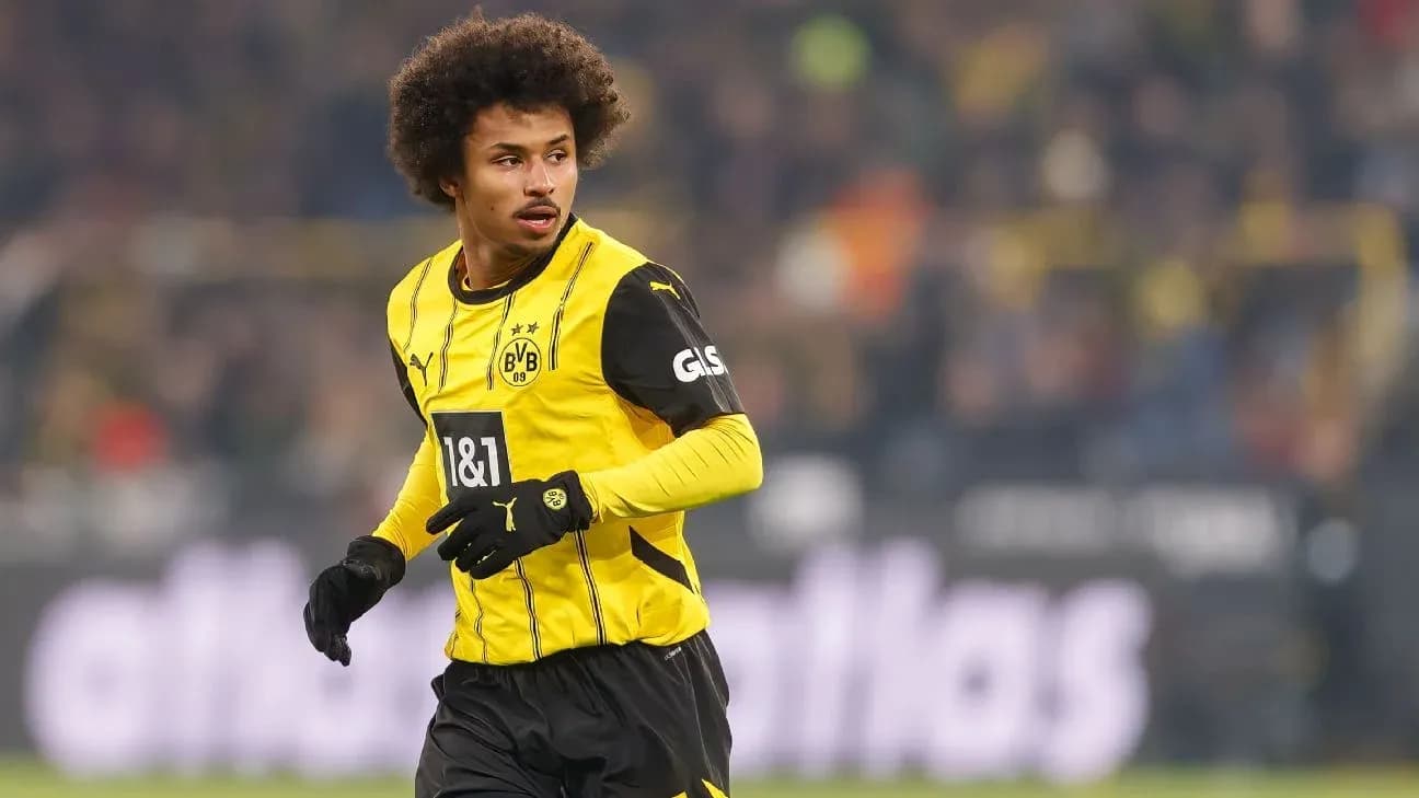 Borussia Dortmund player running on the field