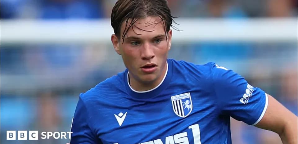 Gillingham FC player running during a match