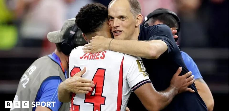 Player and coach hugging after the match
