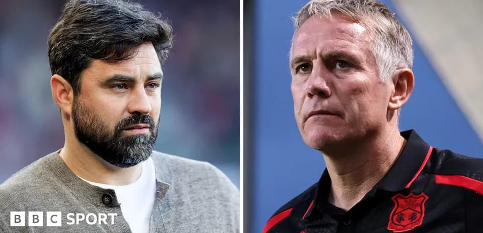 Two football managers during a match