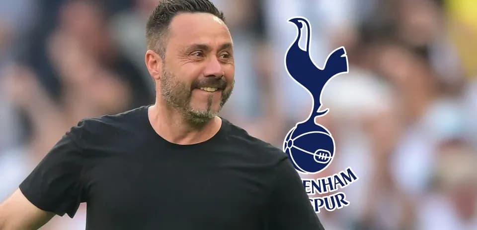 Menecer Tottenham Hotspur stadionunda gülərək yürüyür