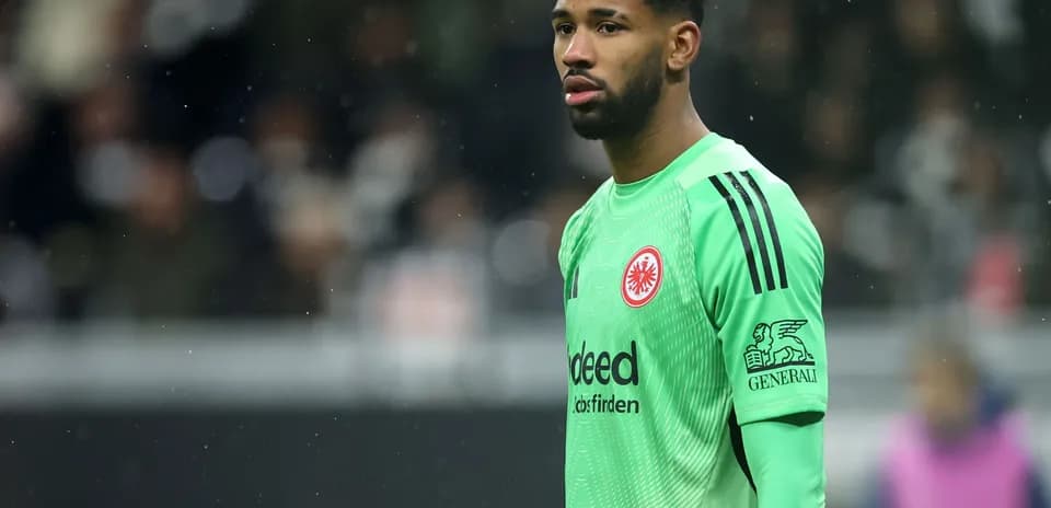 Goalkeeper wearing green jersey during match