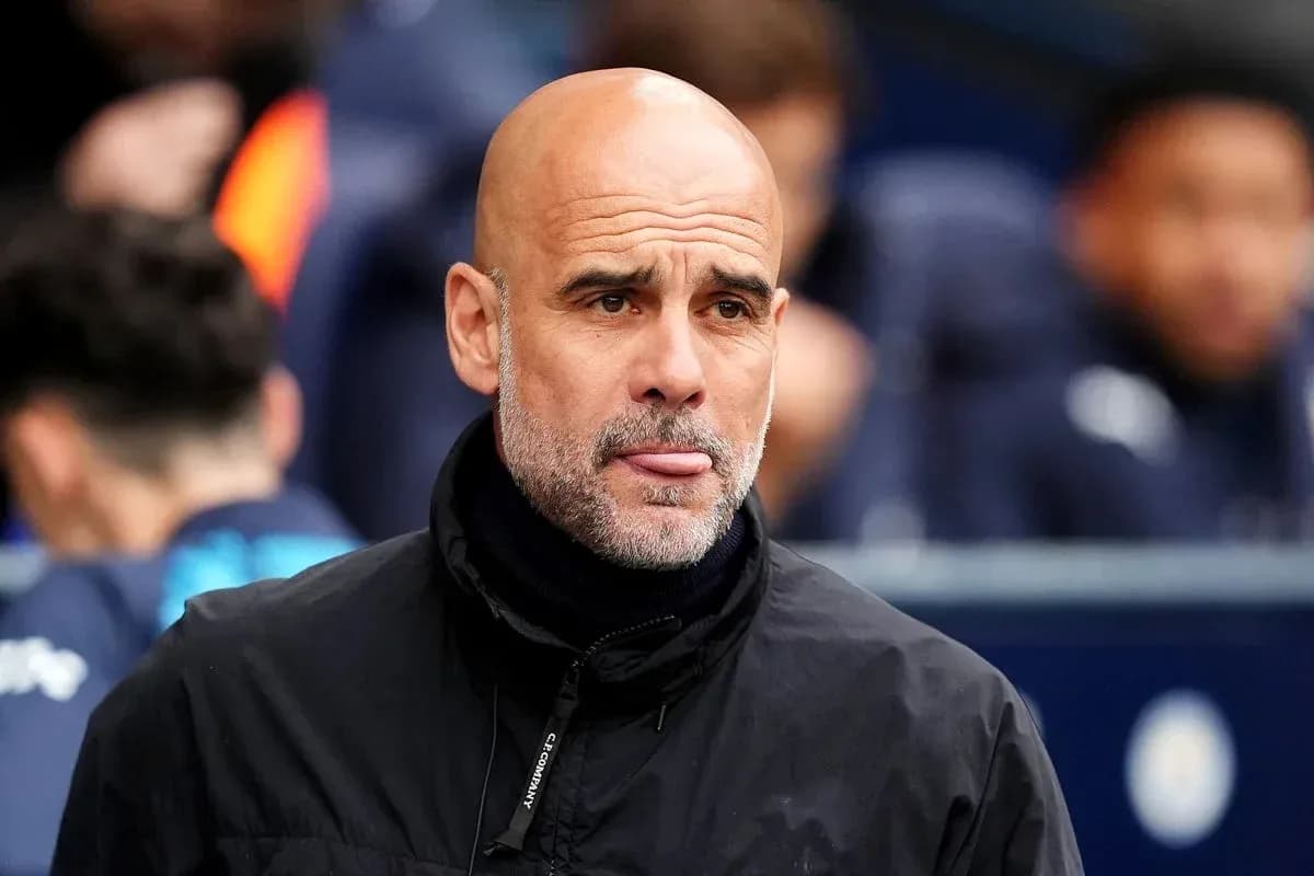 Men's football coach on the sidelines during match