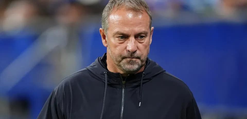 Football manager on the sidelines during match