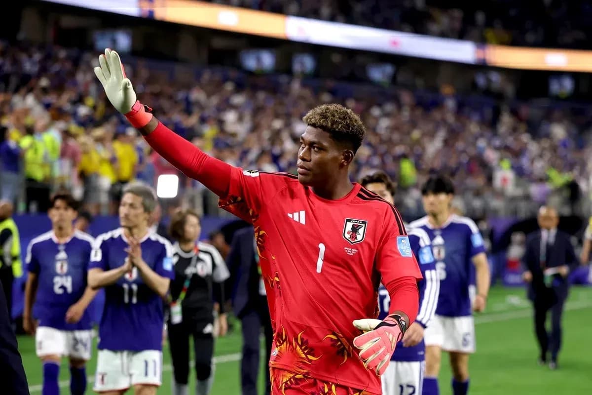 Goalkeeper waving to fans after match conclusion