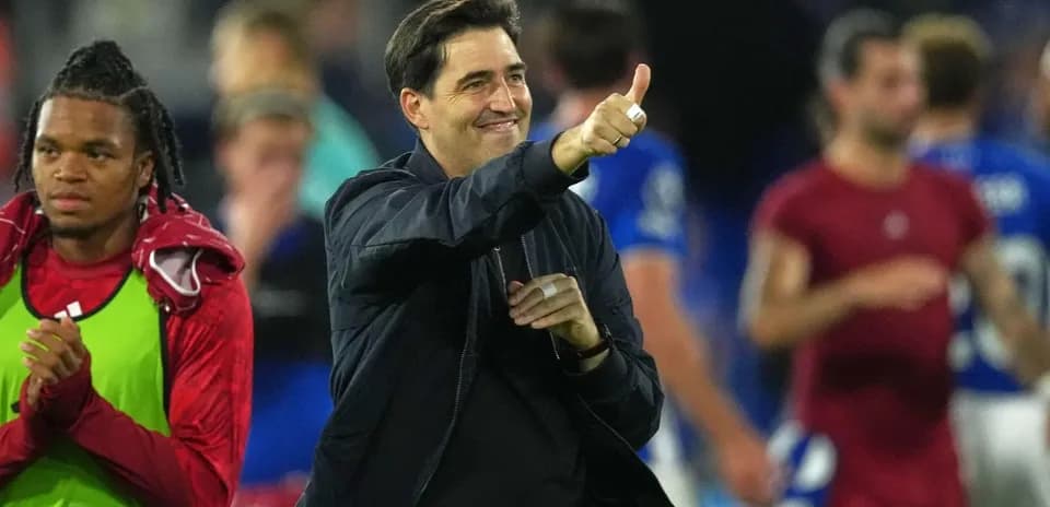 Coach giving thumbs up after the match