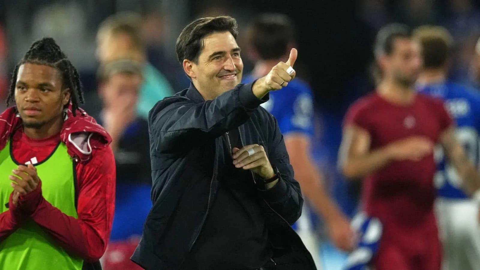 Coach giving thumbs up after the match