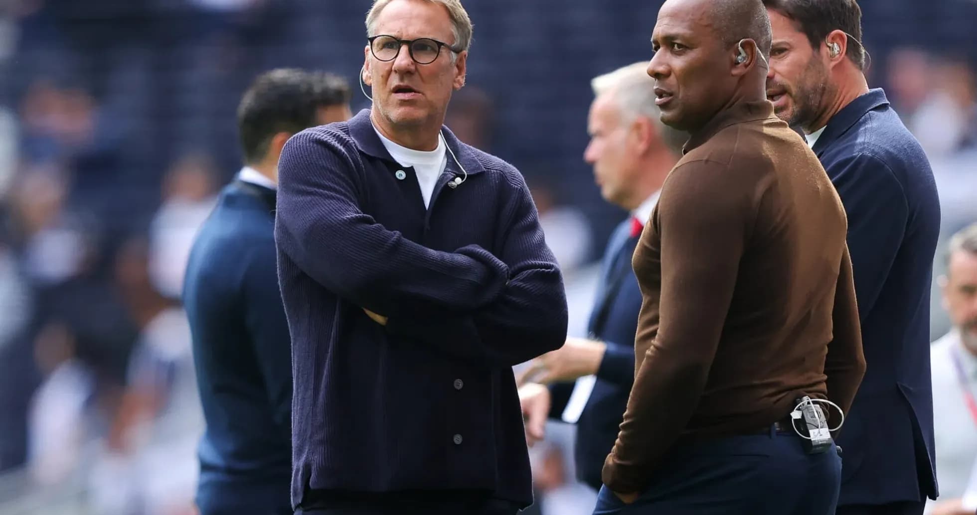 Coaches discussing on the sidelines before match