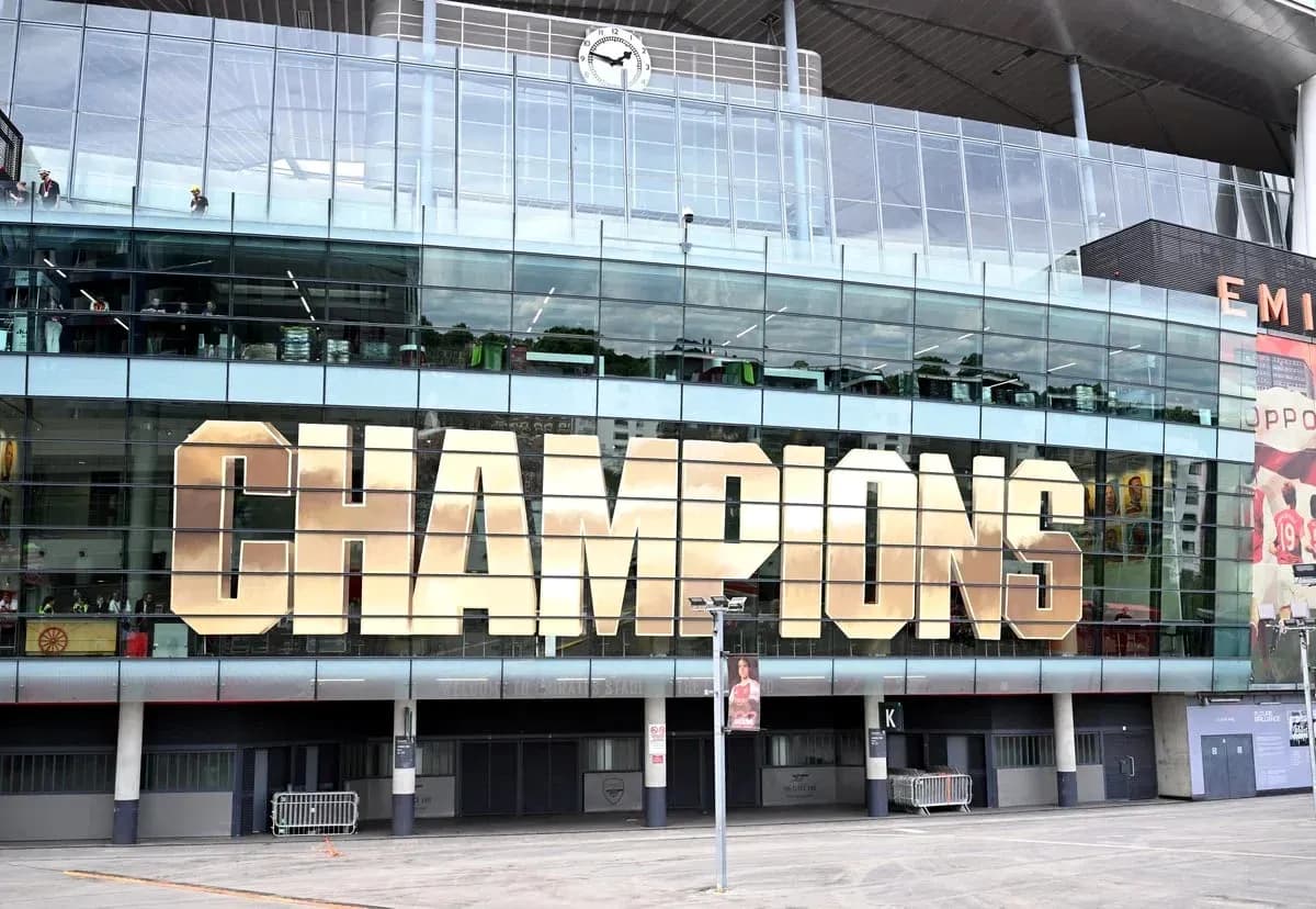 Emirates Stadium displaying 'CHAMPIONS' sign