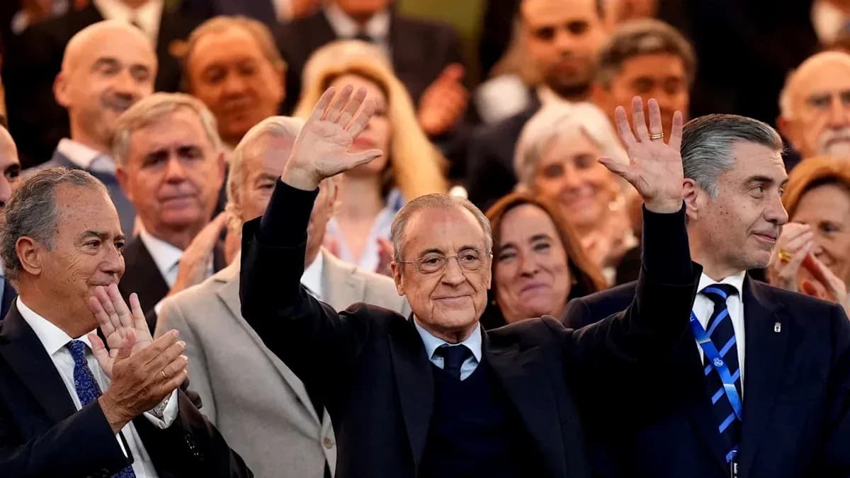 Crowd applauding with a man waving in front