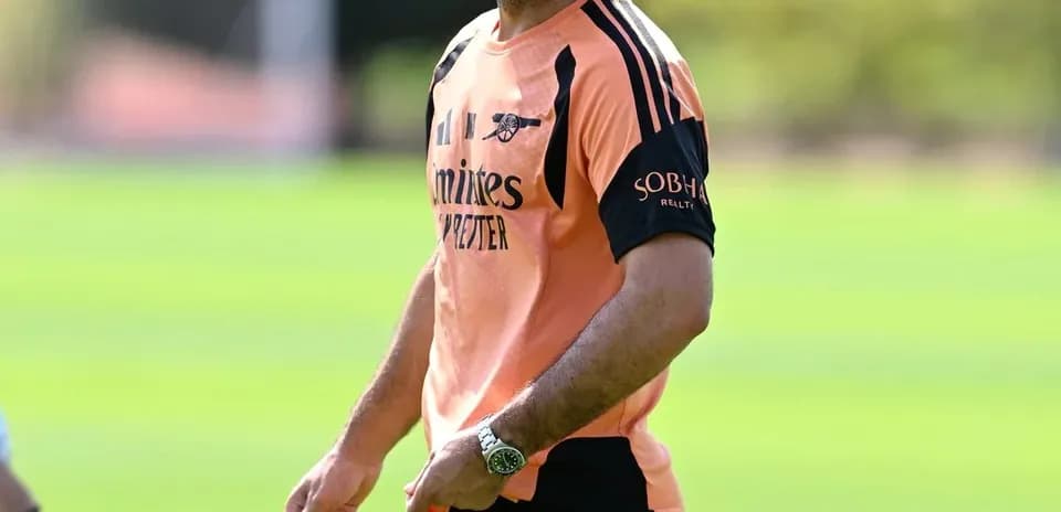 Arsenal manager during training session at pitch