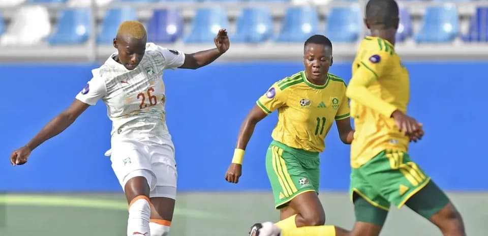 Ivory Coast player kicking ball during match