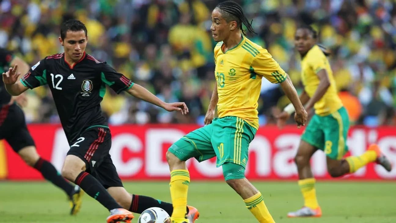 South Africa and Mexico players competing for the ball