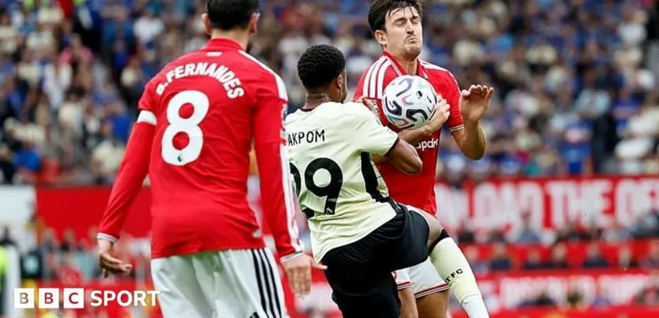 Players contesting for the ball during a match