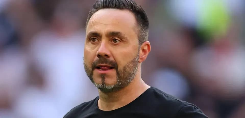 Football manager on the sidelines during match