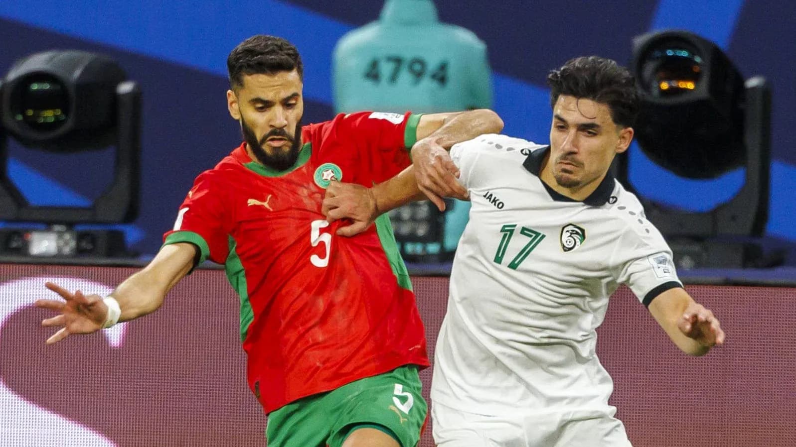 Two players contesting the ball during a match
