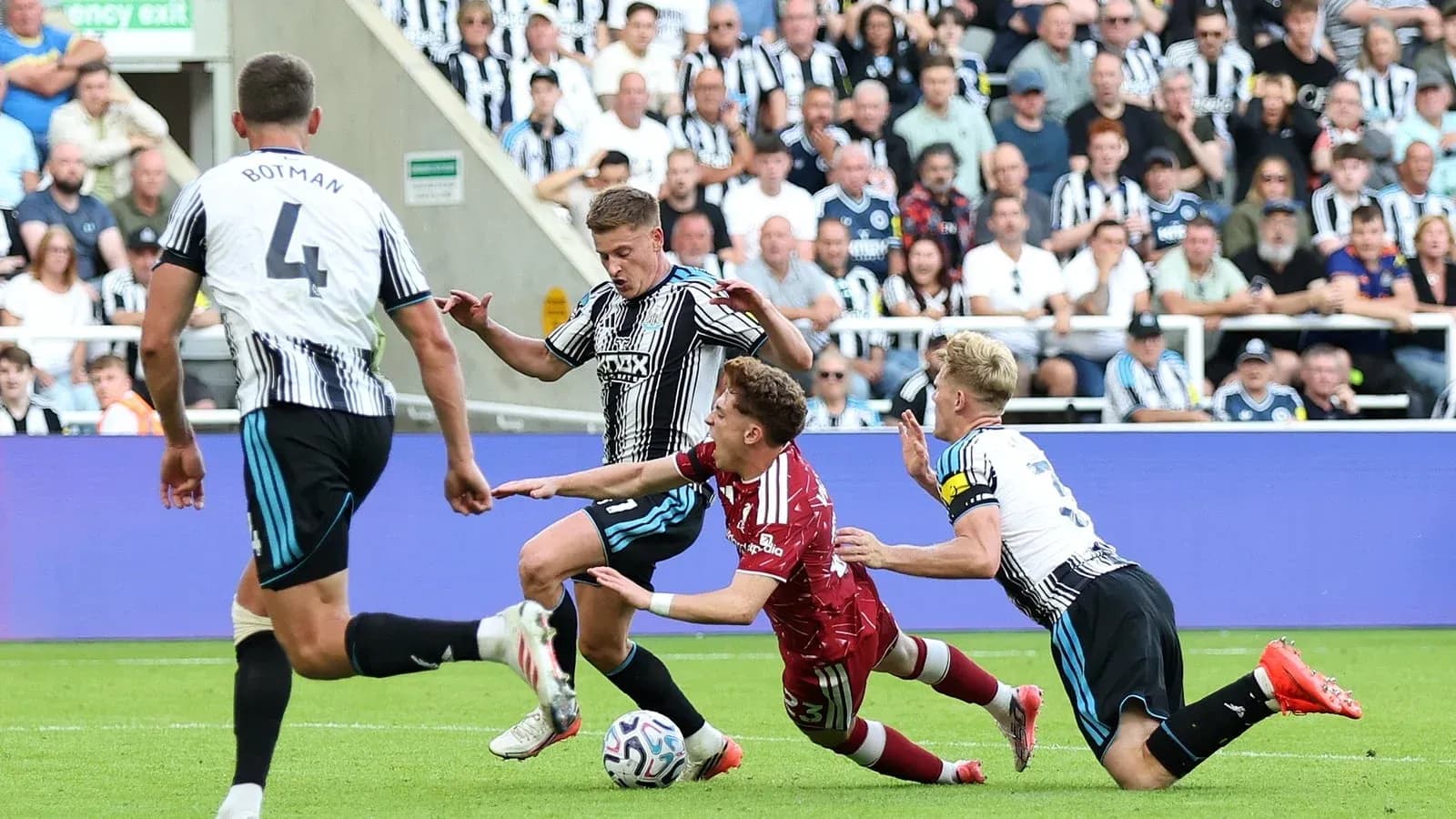 Newcastle players contesting for the ball during match