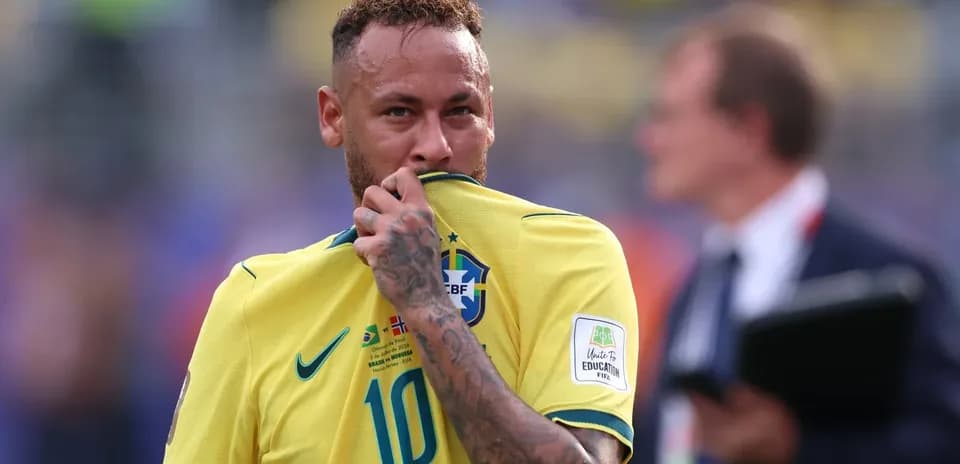 Neymar holding his shirt during a match
