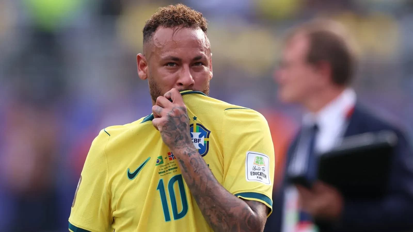 Neymar holding his shirt during a match