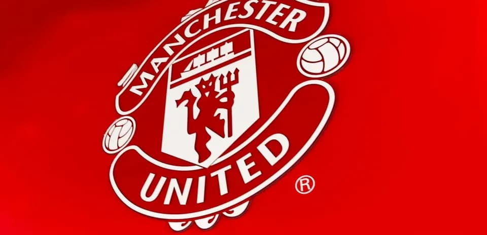 Manchester United logo on red background