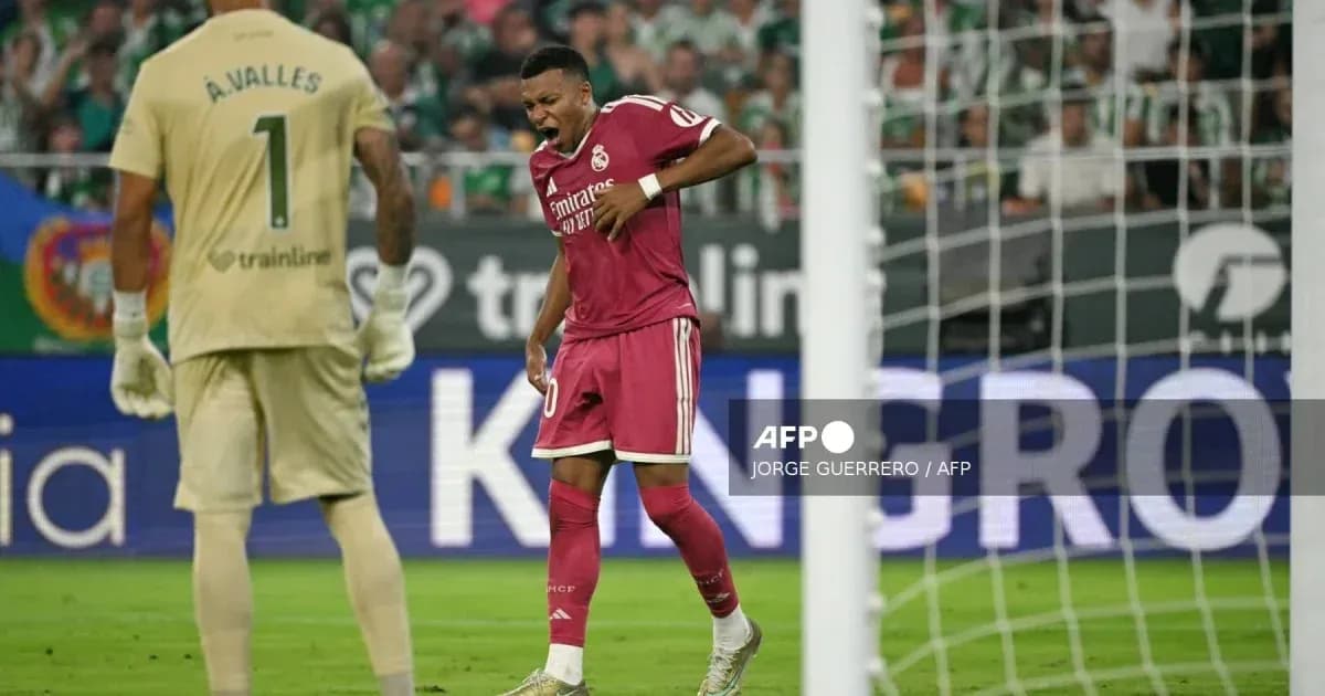 Real Madrid player reacting during match with goalkeeper