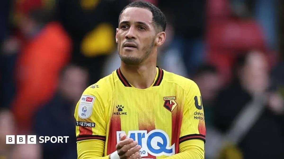 Watford player applauding fans at the stadium