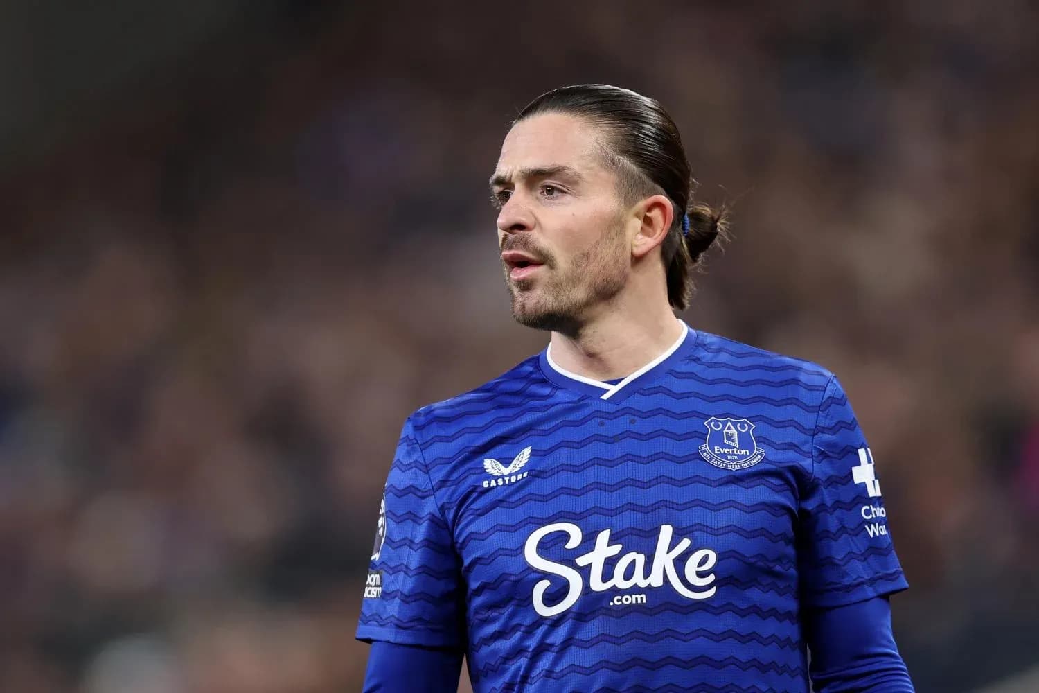 Everton player in blue kit during match