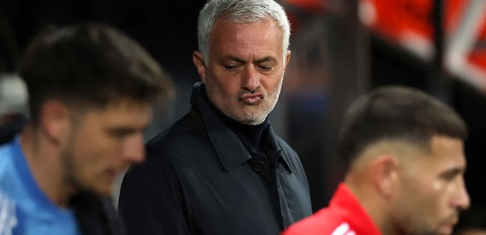 Jose Mourinho observing players on the sidelines