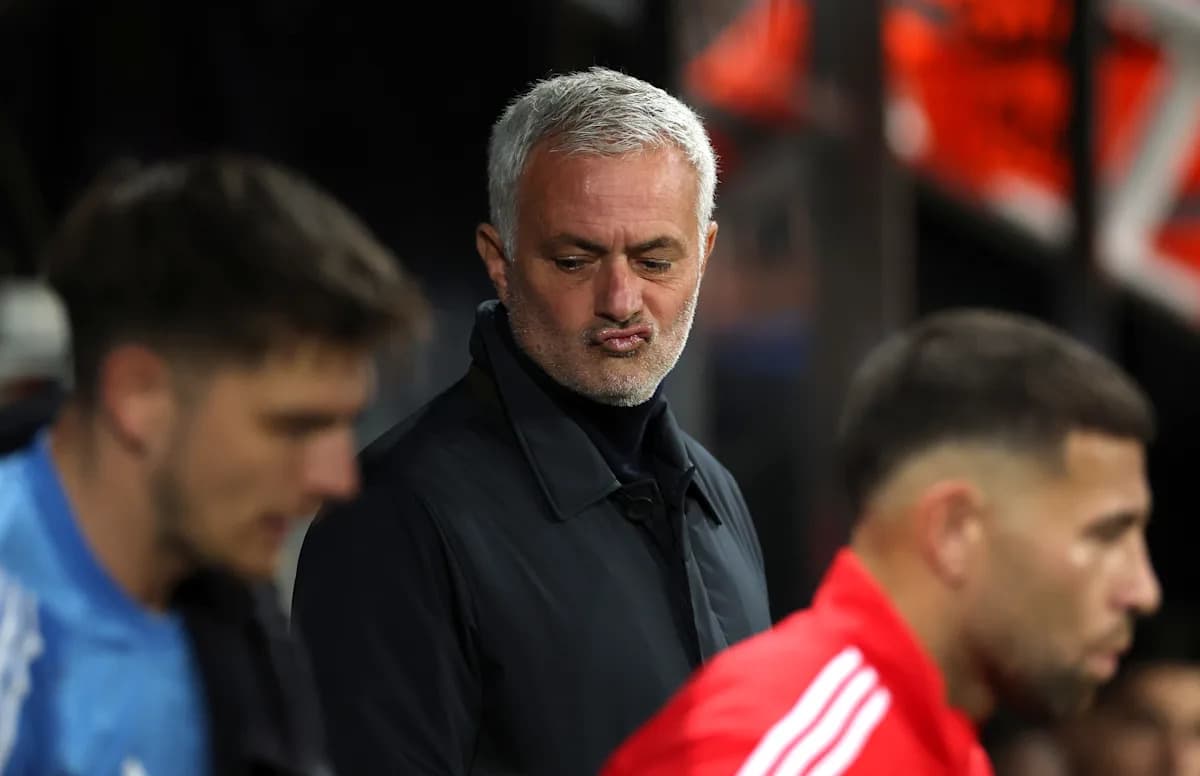 Jose Mourinho observing players on the sidelines