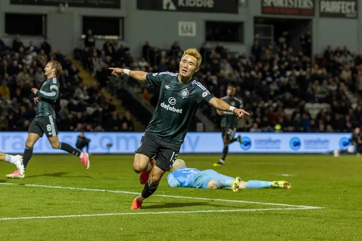 Player celebrating a goal on the pitch