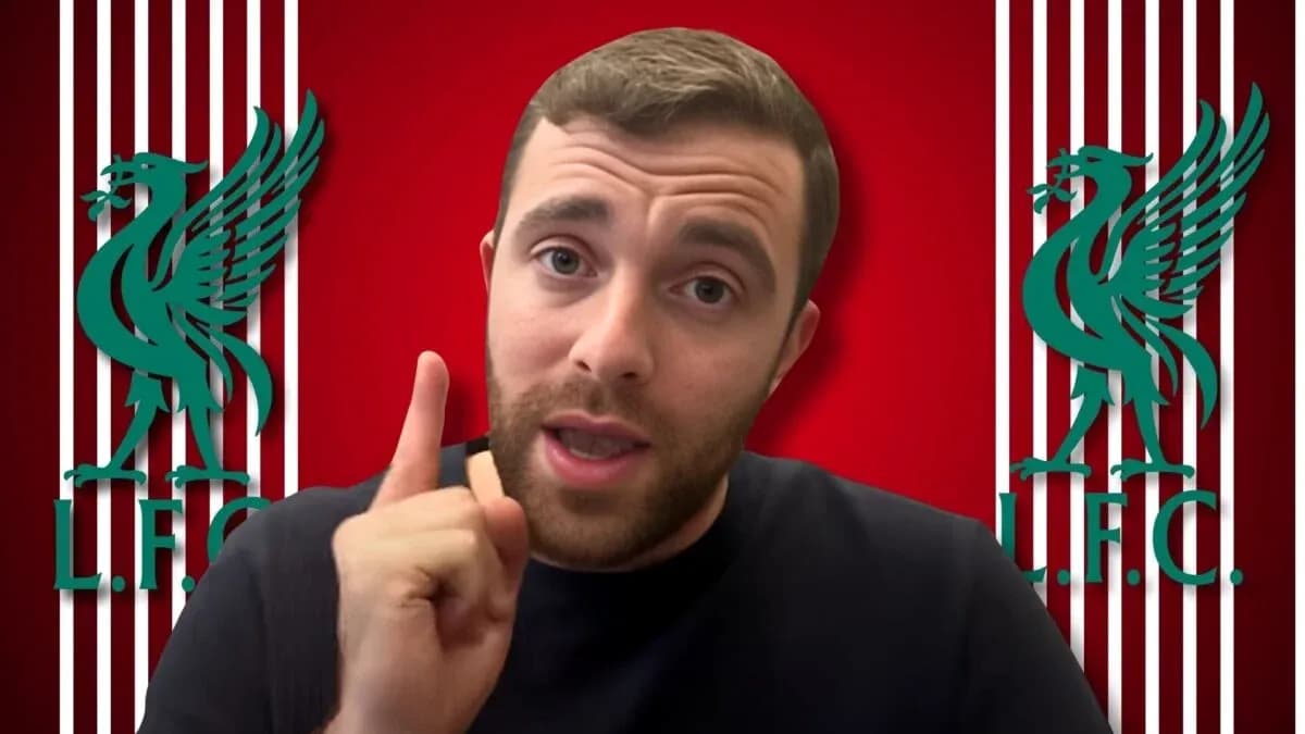 Blogger speaking with Liverpool FC logo background