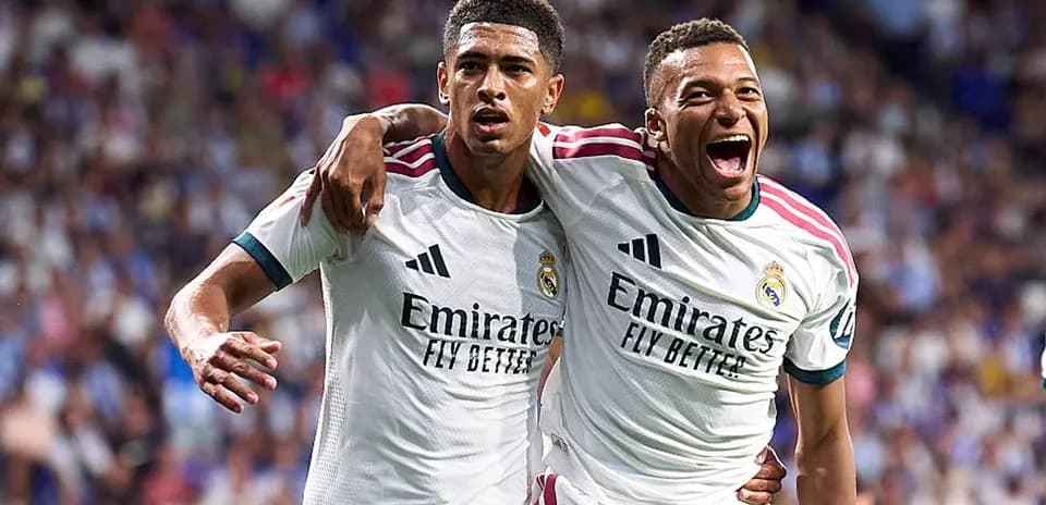 Real Madrid players celebrating a goal together