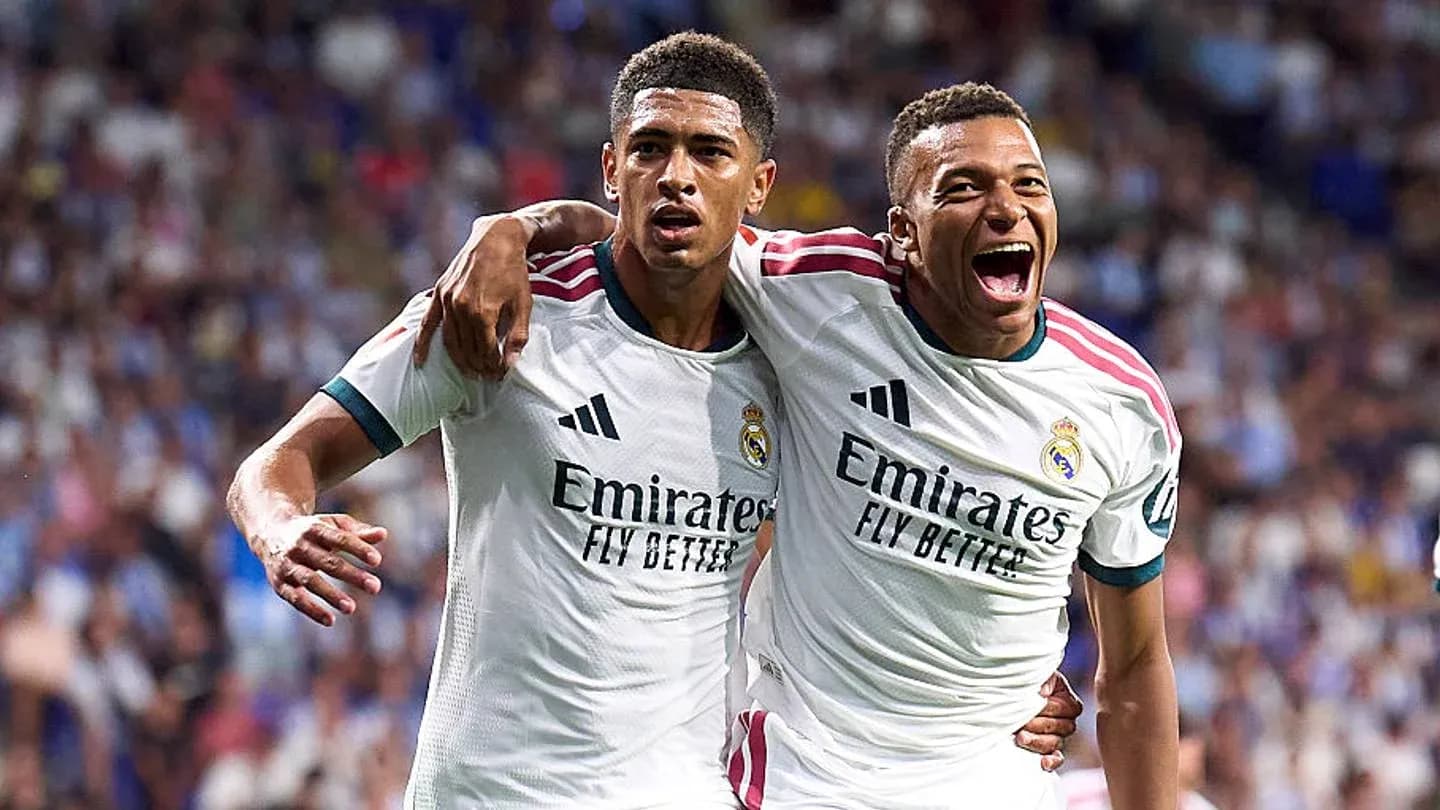 Real Madrid players celebrating a goal together