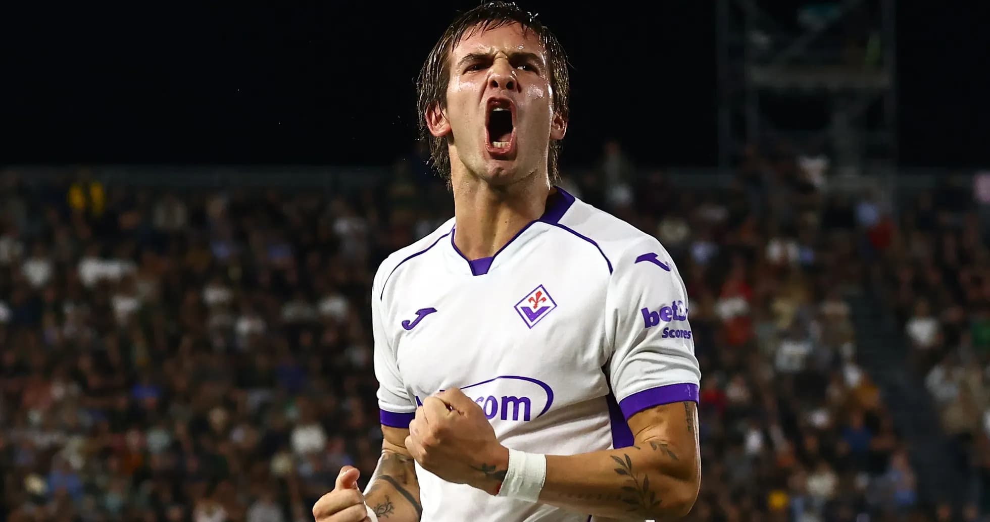 Fiorentina player celebrating a goal during match