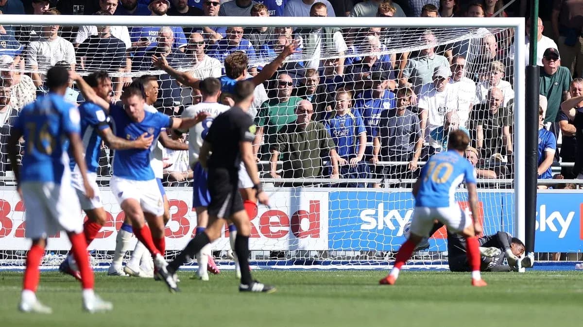 Players celebrating after a goal during match