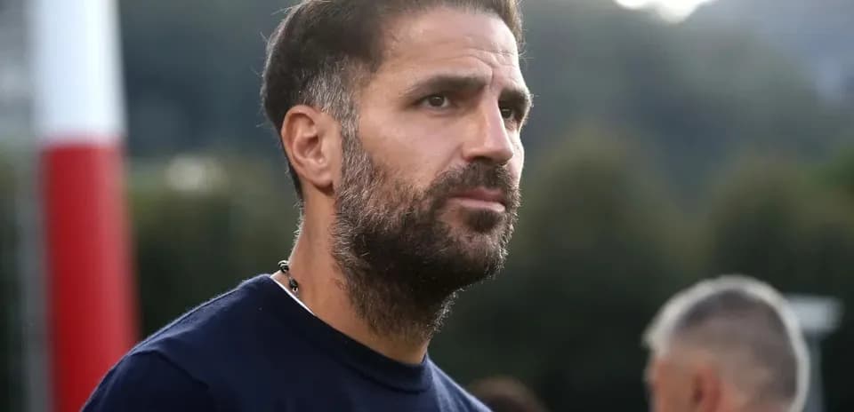 Football coach observing training session outdoors