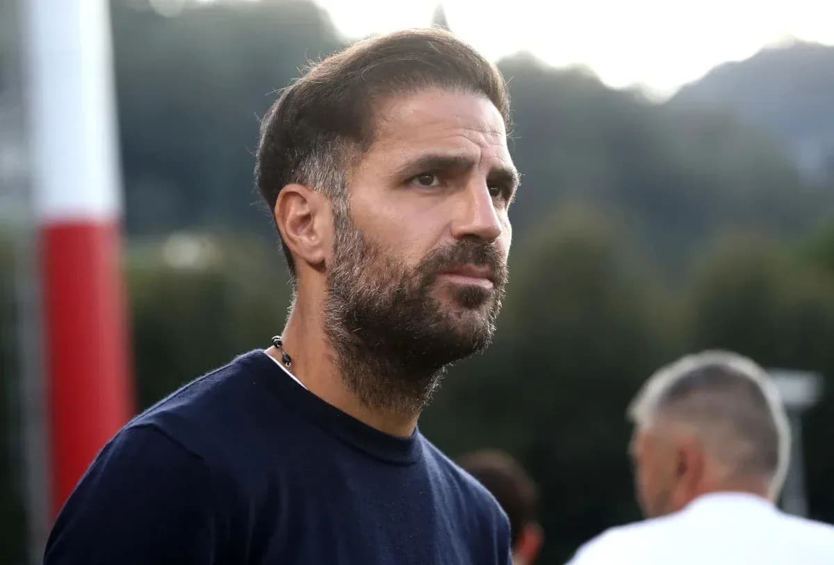Football coach observing training session outdoors