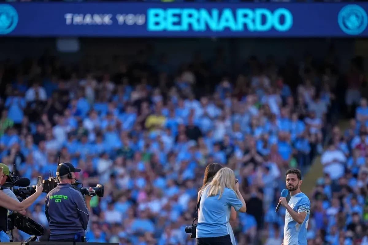 Bernardo Silva speaking to fans at stadium