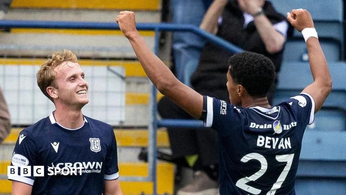 Dundee players celebrating a goal during match