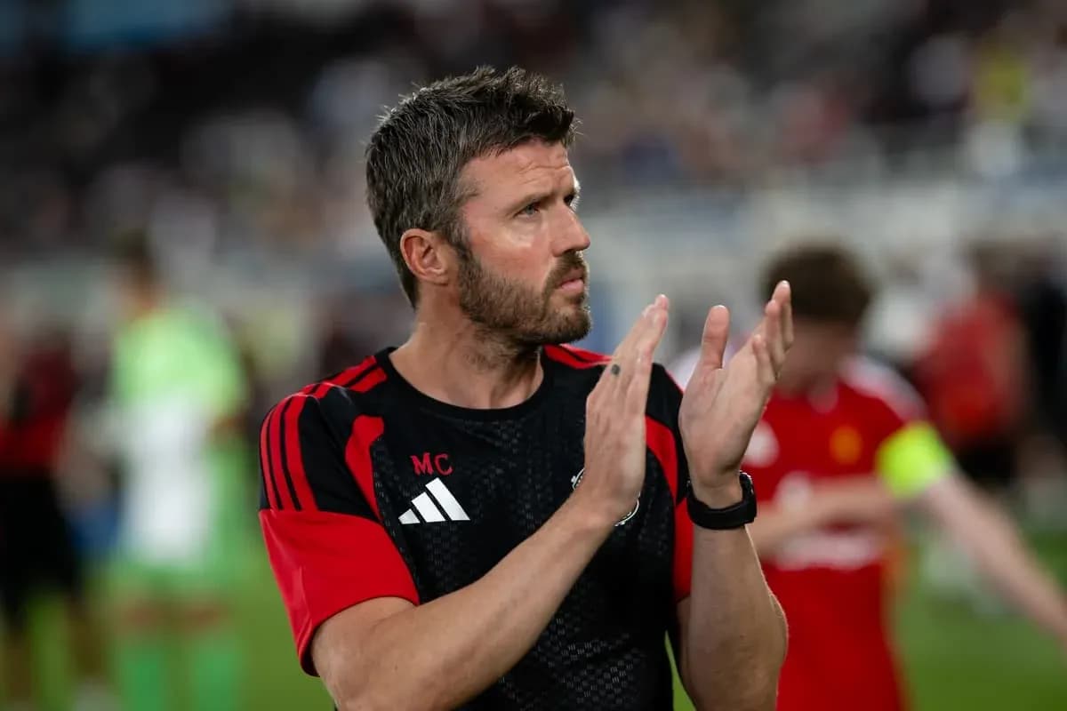 Coach applauding after the match on the field
