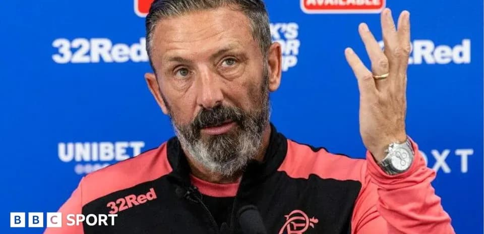 Manager speaking at press conference with gestures
