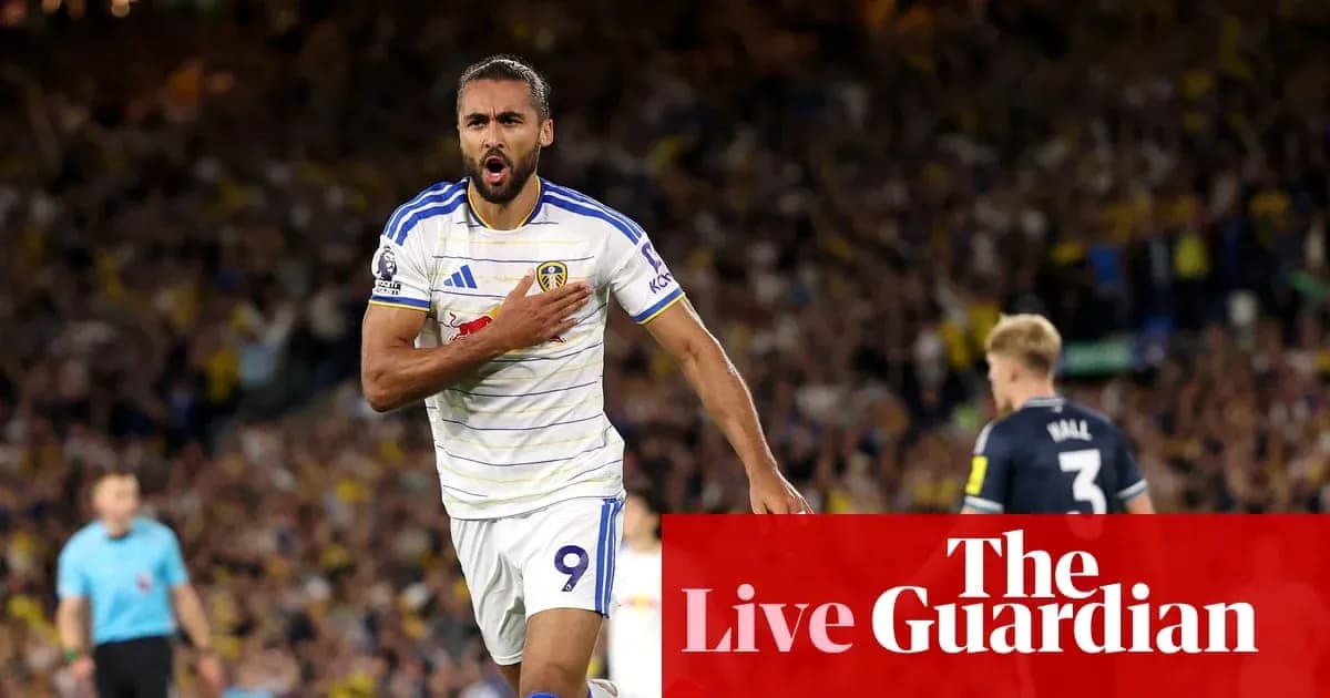 Leeds United player celebrating after scoring goal
