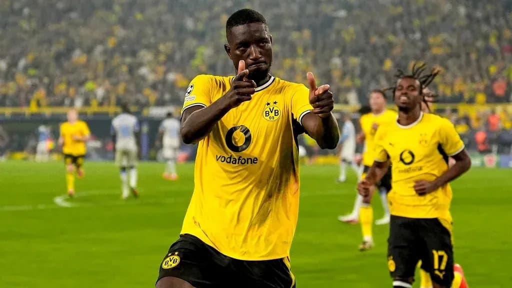 BVB player celebrating goal in yellow jersey