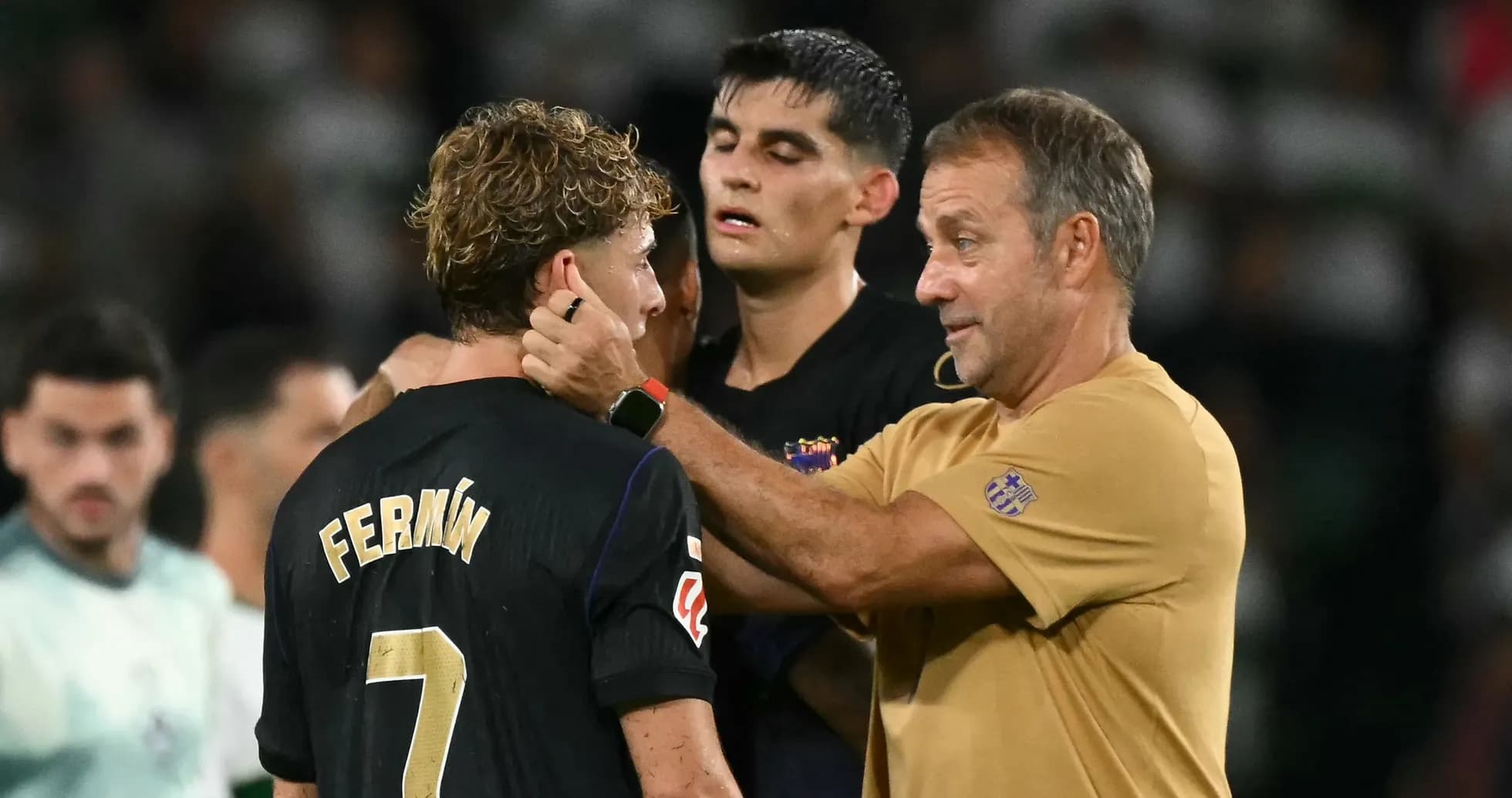 Fermín receiving guidance from coach after match