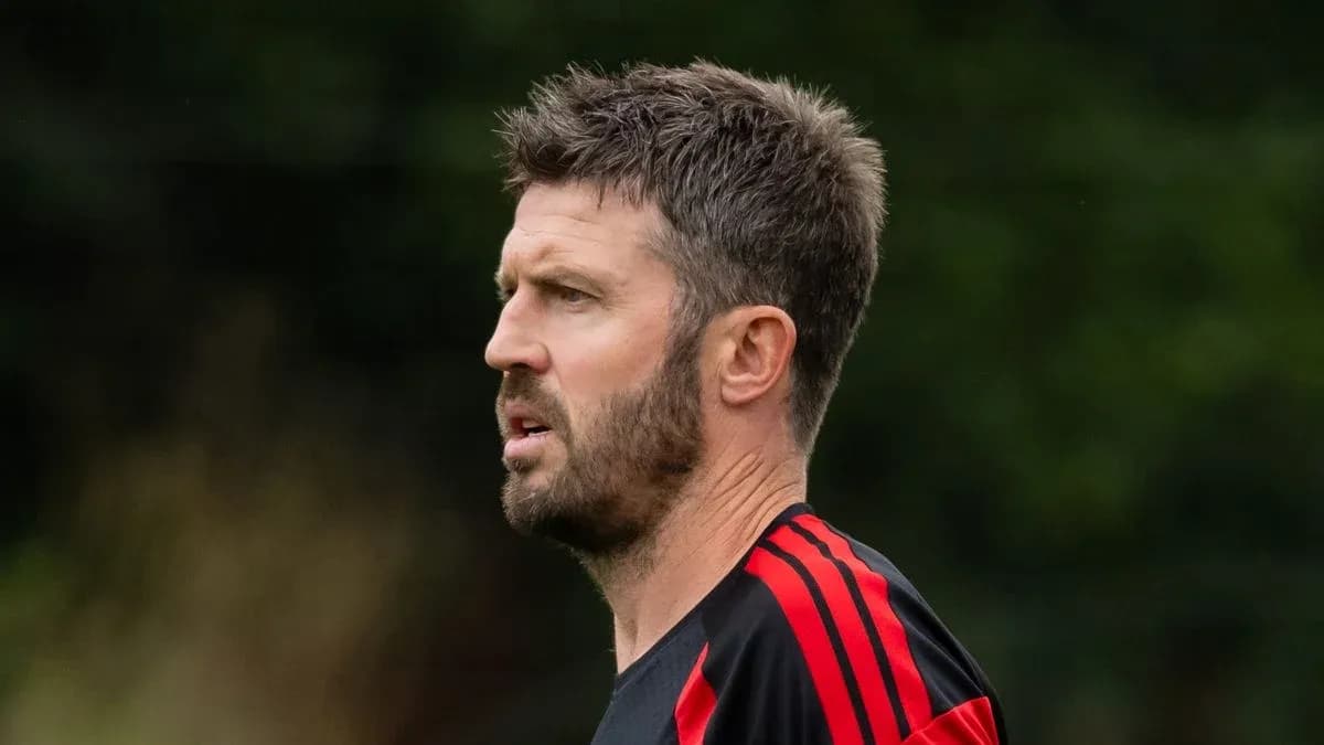 Football coach observing training session outdoors