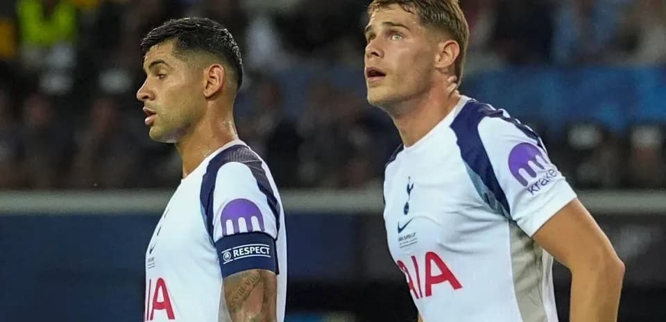 Two Tottenham players observing during a match